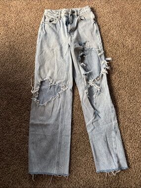 Light Wash Distressed Women’s Jeans - size 23 from Pac Sun